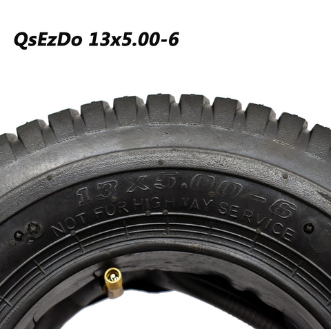 QsEzDo inner-tube valve close-up demonstrates reliable inflation for wheelbarrows.