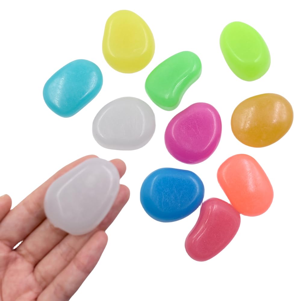 QTTLLI glow pebbles in mixed colors illuminate a garden path at night