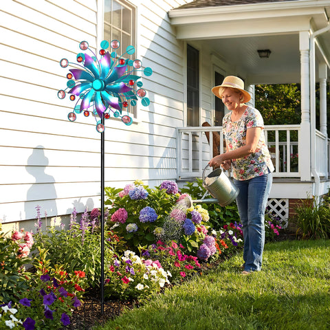 Qualdout Solar Wind Spinner demonstrating dual-direction spin in a sunny yard