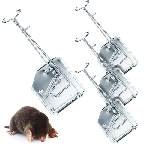 Qualirey mole trap in hole with durable galvanized steel for outdoor use.