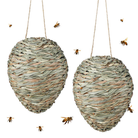 Qualirey two-pack wasp nest decoys hanging in a garden to deter wasps and create a peaceful outdoor space.