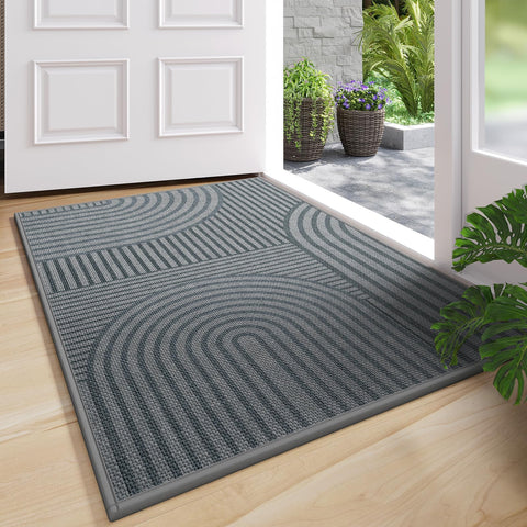 QiCaiJia front door mat 24x35 in grey absorbs moisture to keep entry dry.
