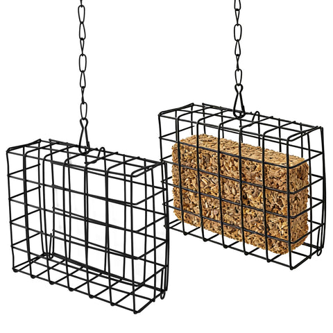 Quivorant cage feeder near tree trunks increases bird visits.