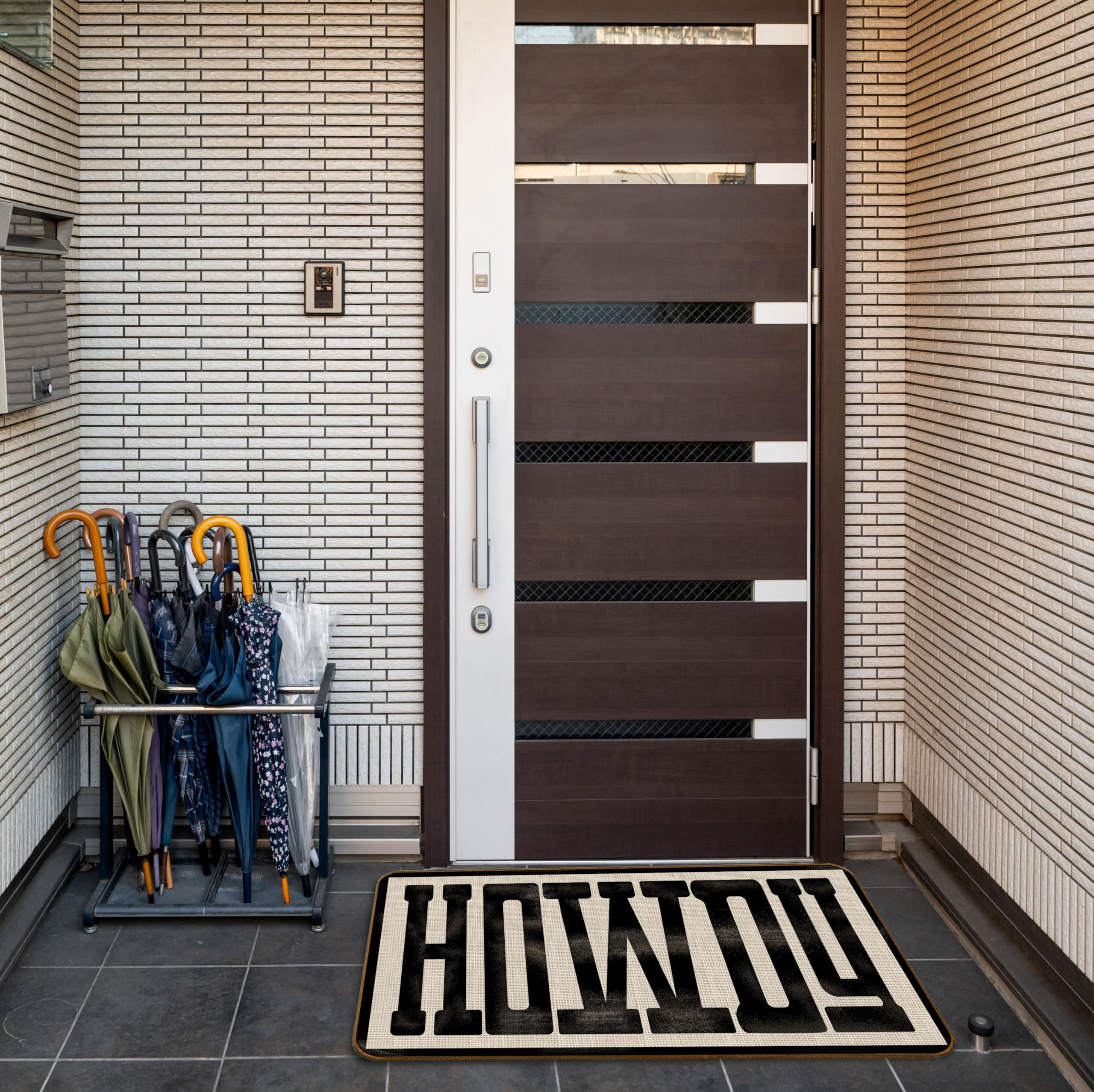 Qvapt Howdy Doormat indoor/outdoor versatility suits porches and foyers year-round.