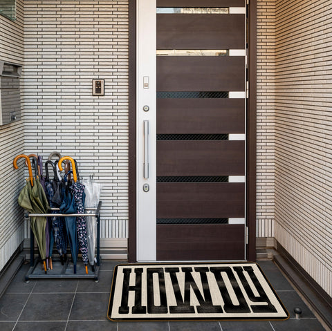 Qvapt Howdy Doormat indoor/outdoor versatility suits porches and foyers year-round.