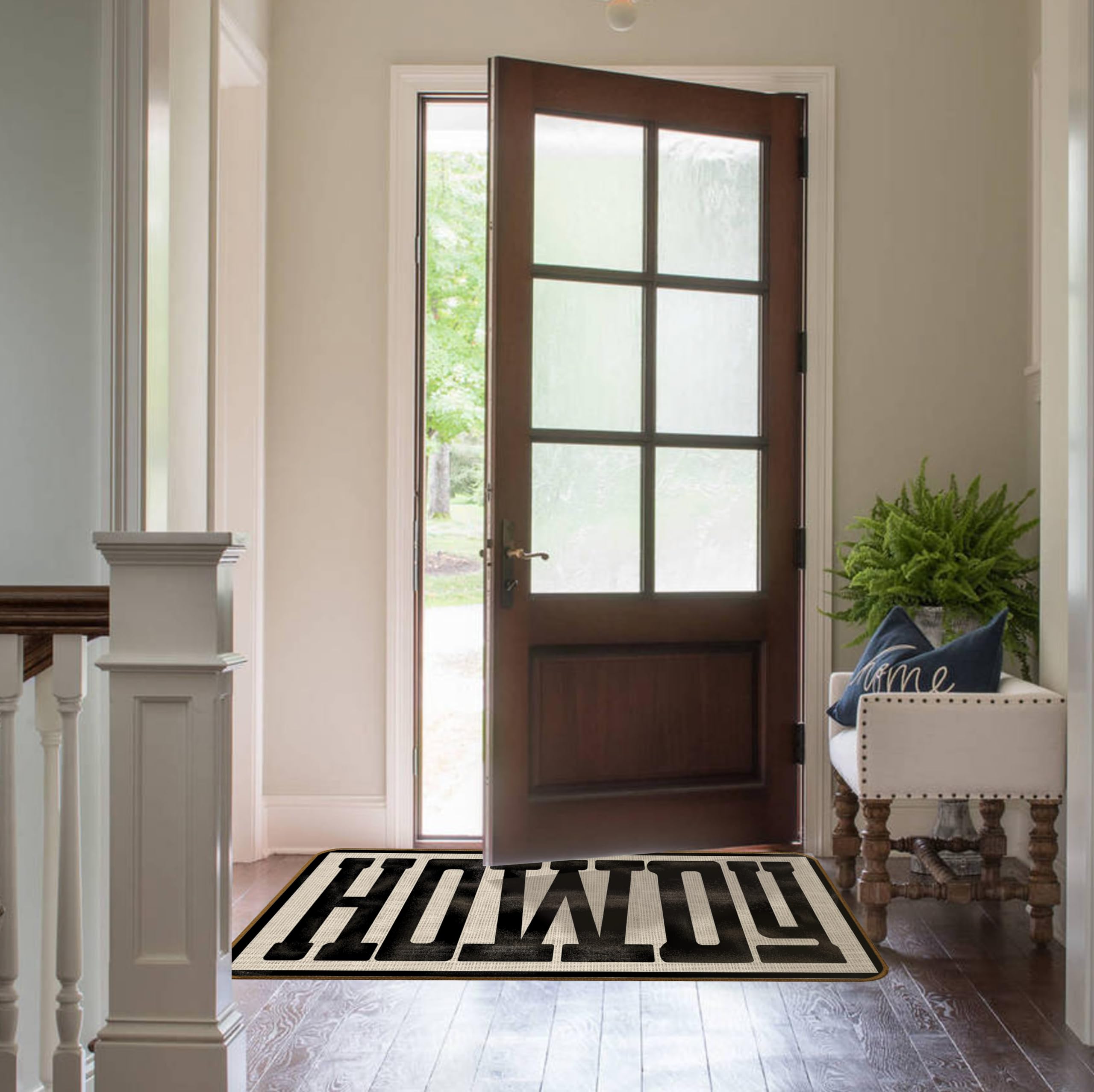 Qvapt Howdy Doormat linen surface trims debris and preserves clean floors.