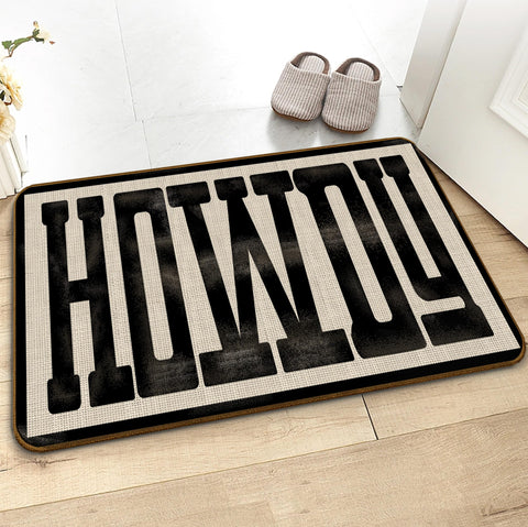 Qvapt Howdy Doormat non-slip backing keeps mat in place on busy doorways.