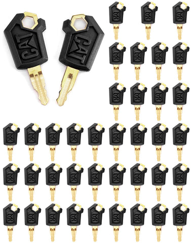 QWORK ignition keys in use on a CAT machine