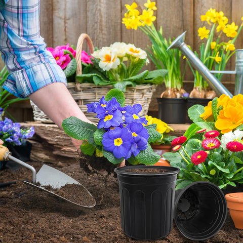 Qyyiguf pots with white labels for easy plant labeling and tracking.