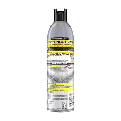 Raid Max spray action shows foam clinging to a nest for effective treatment.