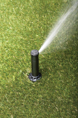Rain Bird 32SA 4-inch pop-up height clears taller grass for full spray.