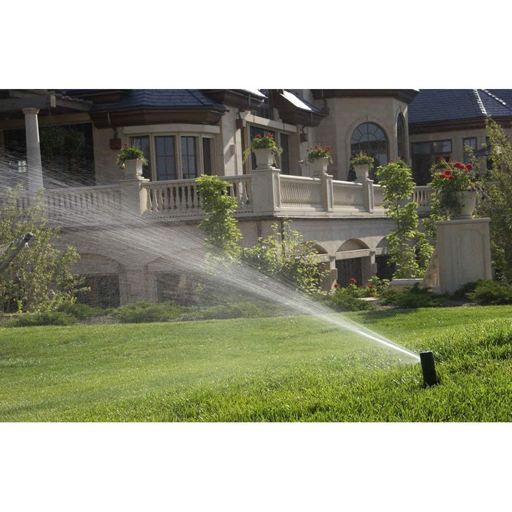 Rain Bird 5000 rotor head with adjustable arc for precise irrigation.