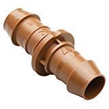 Rain Bird BC50 5-pack barbed coupling shown for secure, leak-proof irrigation tubing connections.