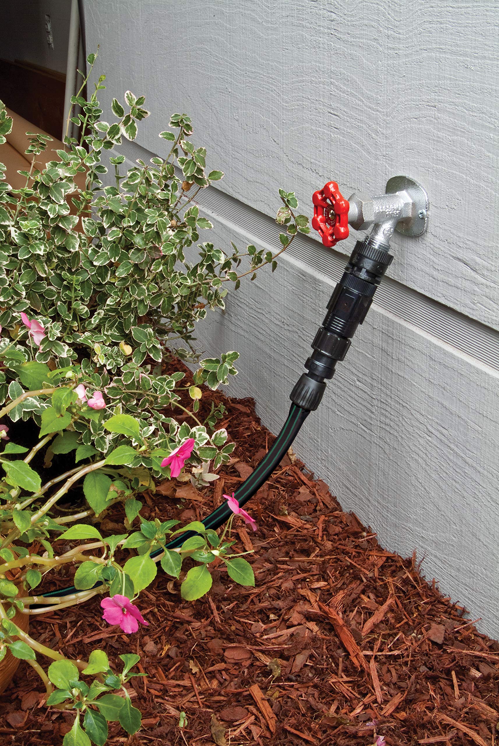 Rain Bird FCKIT-1PK pressure regulator maintains steady irrigation pressure for drip lines.