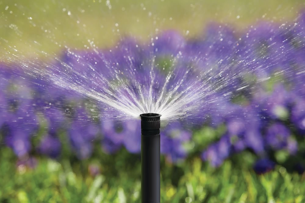 Rain Bird HE-VAN-15 nozzle closeup for precise, adjustable watering.