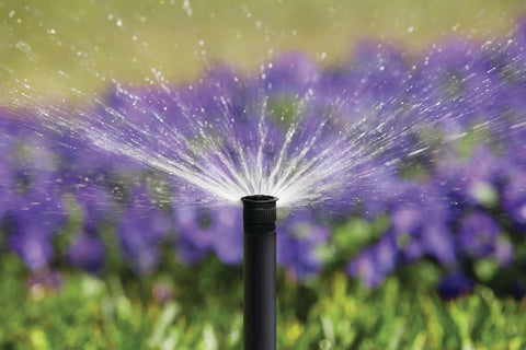 Rain Bird HE-VAN-15 nozzle closeup for precise, adjustable watering.
