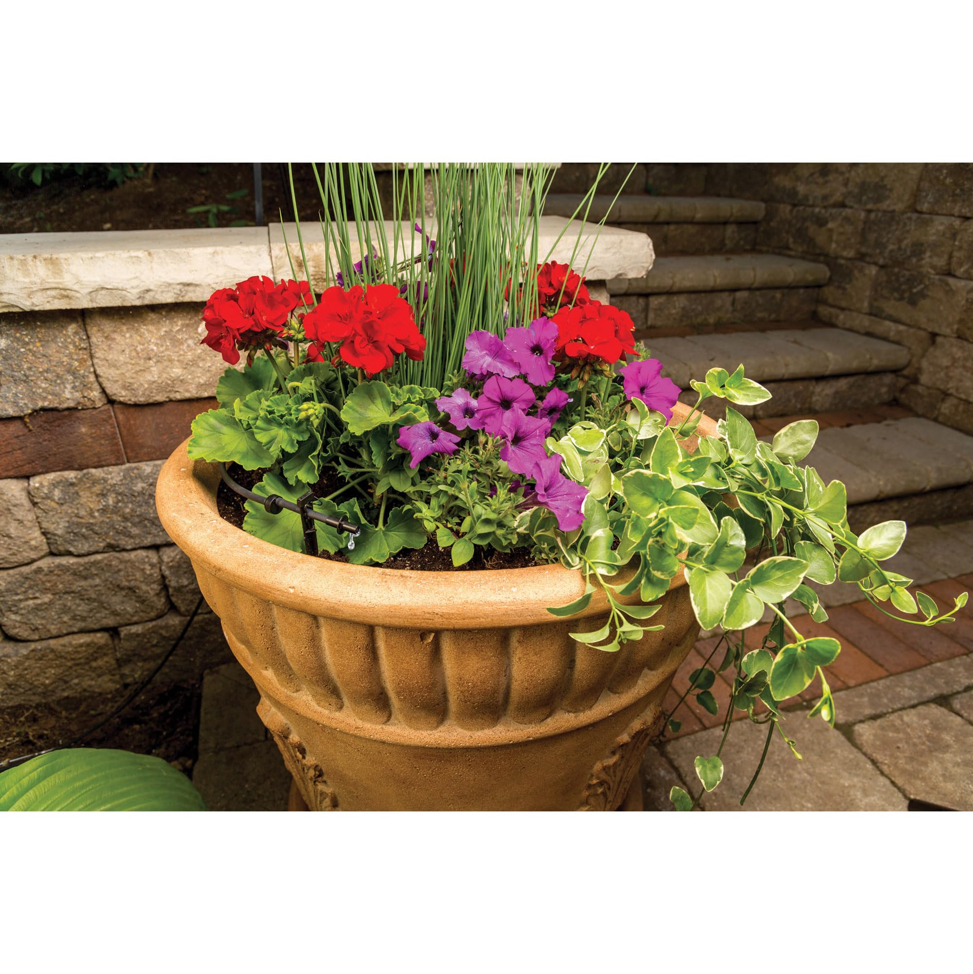Rain Bird LNDDRIPKIT outdoor installation near faucet enables quick setup.