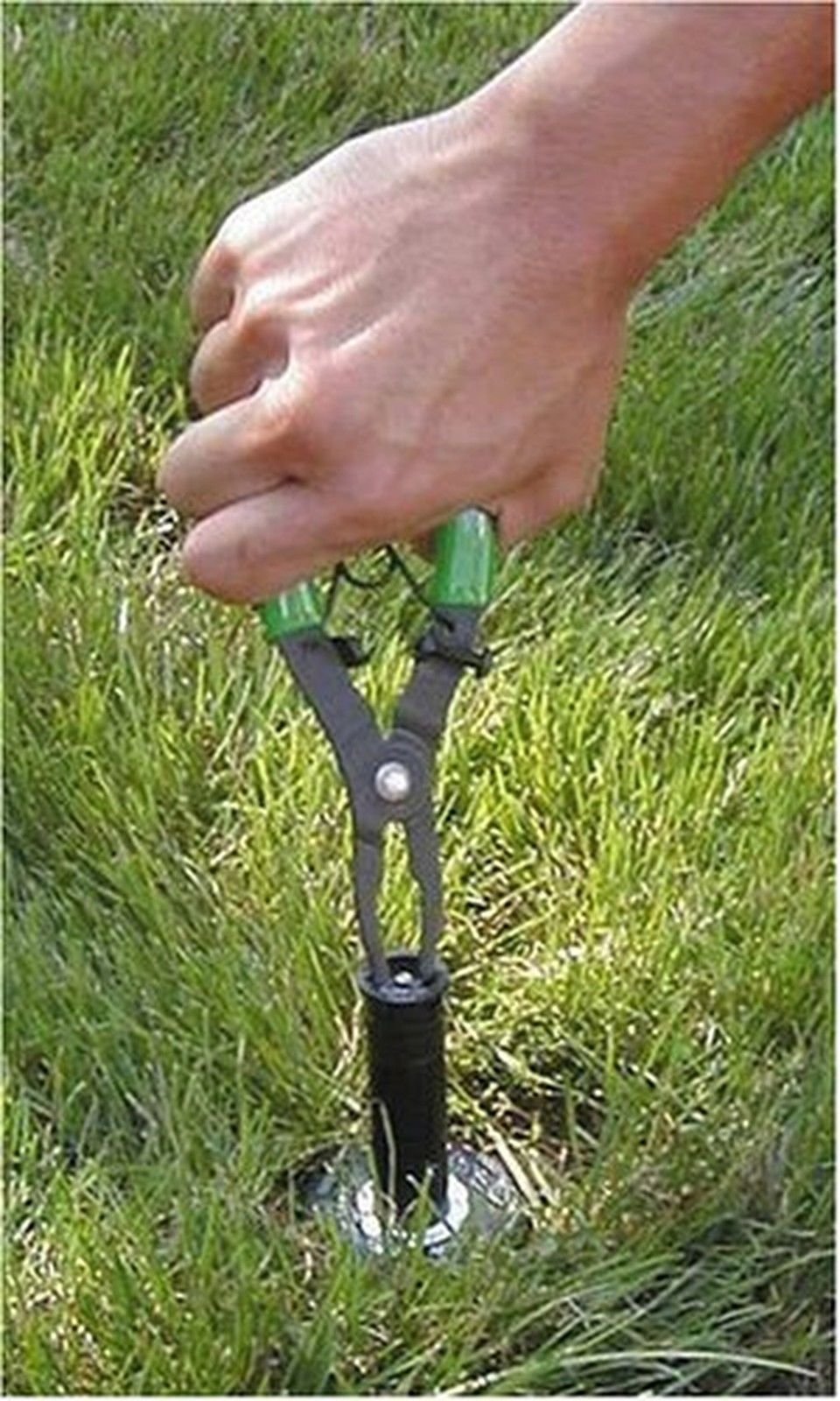 Rain Bird PTC1 tool in action during sprinkler maintenance shows hands-free operation