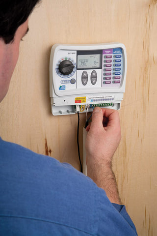 Rain Bird SST900IN dial and display highlighting zone controls for scheduling
