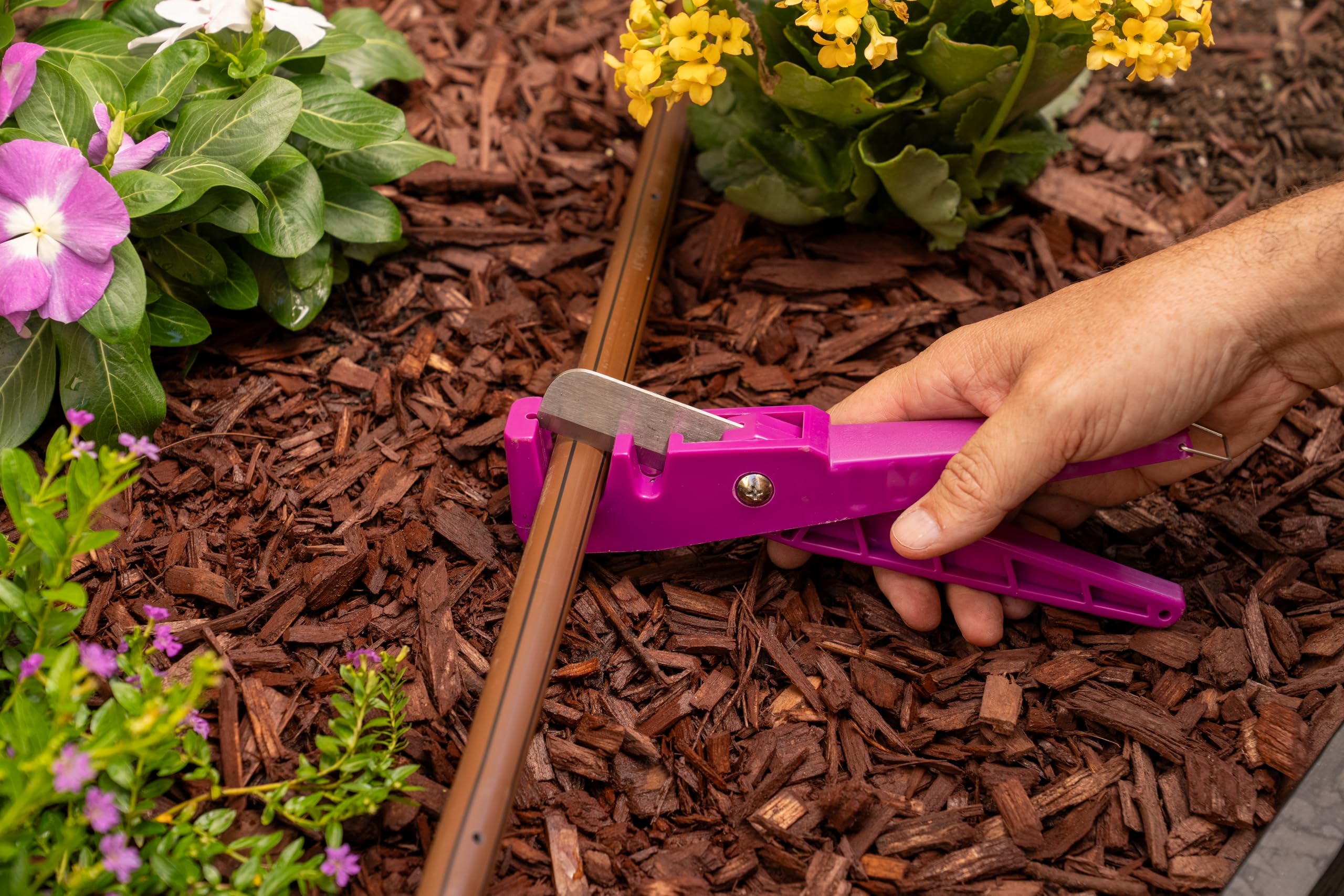 Rain Bird TC/1PKS cutter in action cutting drip tubing smoothly