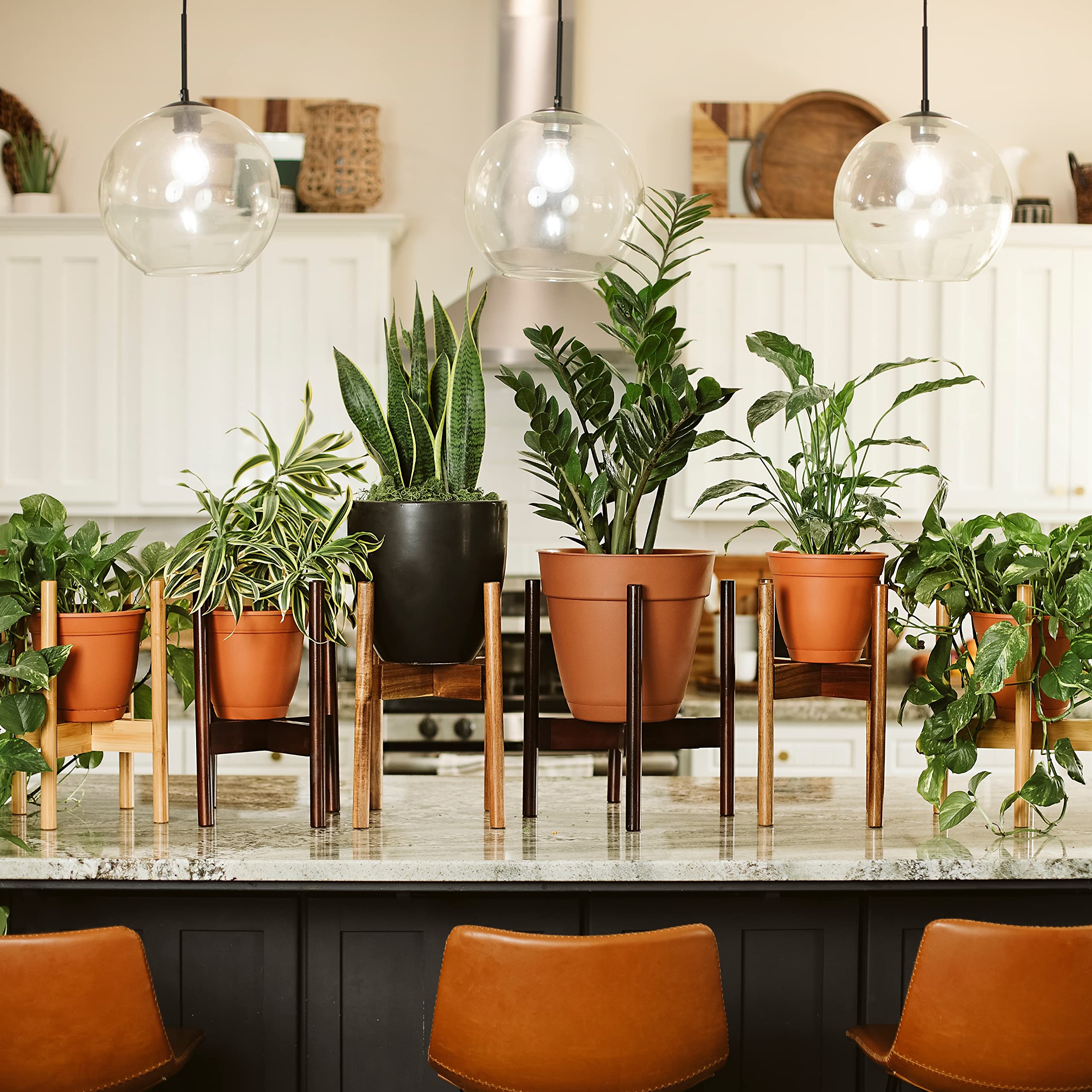 RAINBLELAND adjustable stand fits pots up to 12 inches for a snug hold.