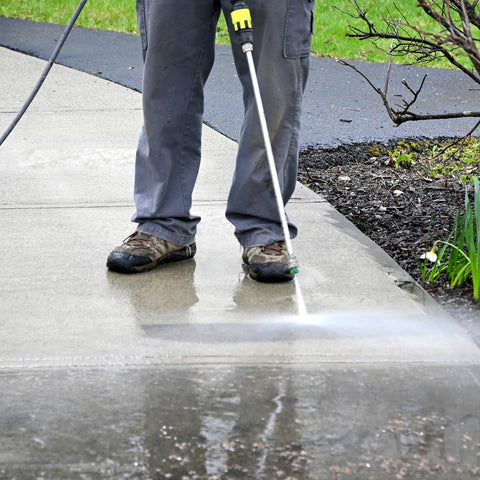 Raincovo wand extends reach to clean driveways without bending.