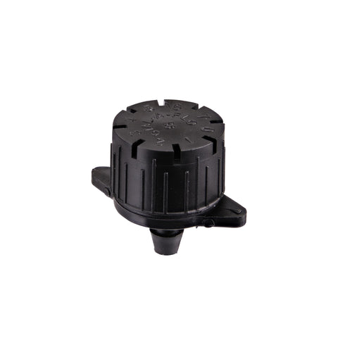Raindrip bubbler dial adjustment enables precise flow control for garden beds.