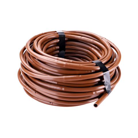 Raindrip R283DT dripline with 12-inch emitter spacing for even moisture across garden beds