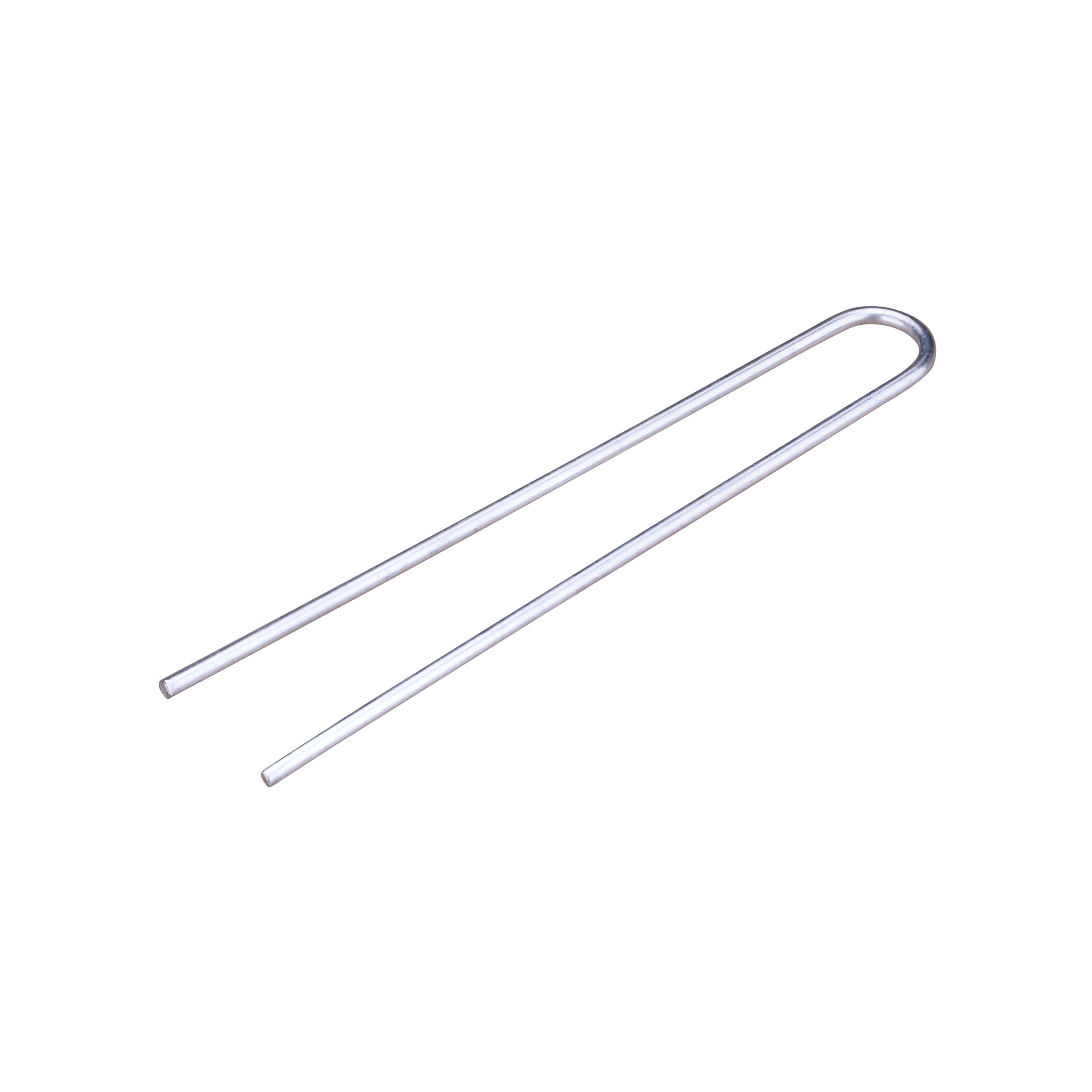 Raindrip R396CB tubing hold-down stake securing irrigation tubing near plant roots for stable watering.