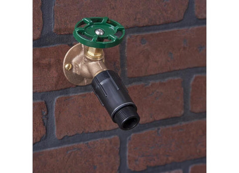 Close-up of Raindrip R463CT FHT/MHT connections for drip tubing.