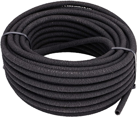 Raindrip soaker hose 50ft in garden delivers gentle soil hydration for vegetables