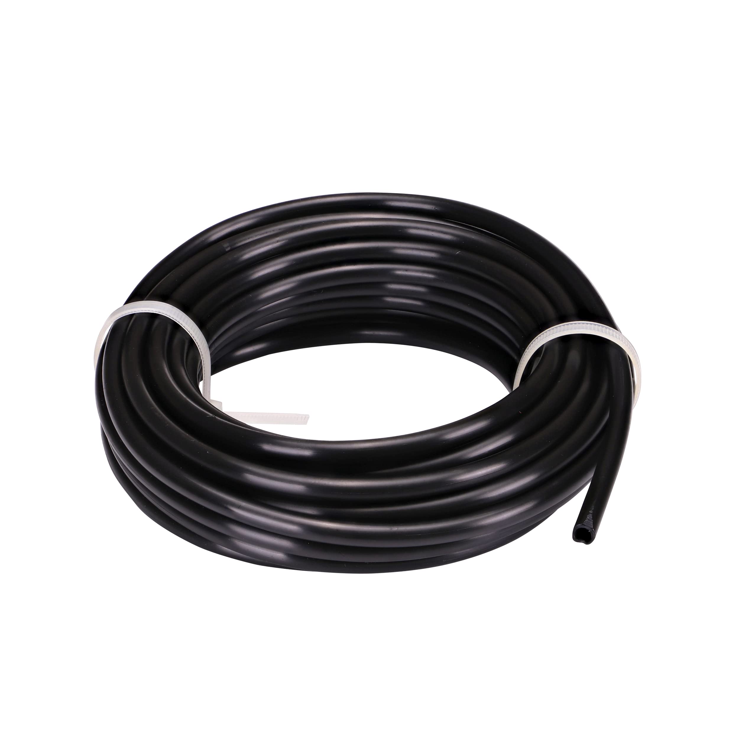 Raindrip 1/4-inch tubing coil for drip irrigation waters trees and beds.