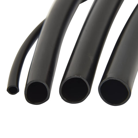 Raindrip tubing with barbed connector showing simple main line setup.
