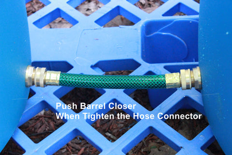 RAINPAL RBL020: installation-ready bulkhead fittings on a rain barrel.