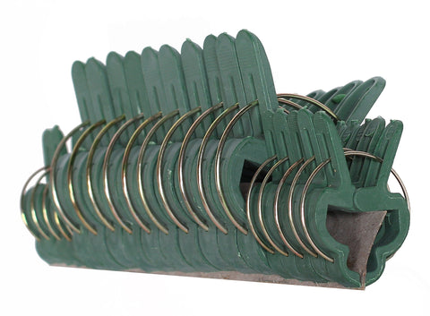 Ram-Pro green gardening clip securing a plant stem to a stake for support