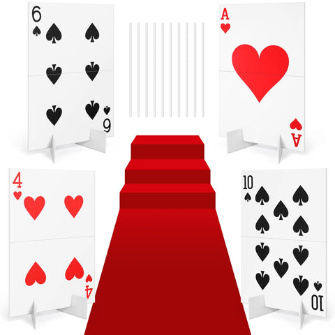 Reallnaive casino signs with giant poker fronts create a dramatic outdoor entrance.