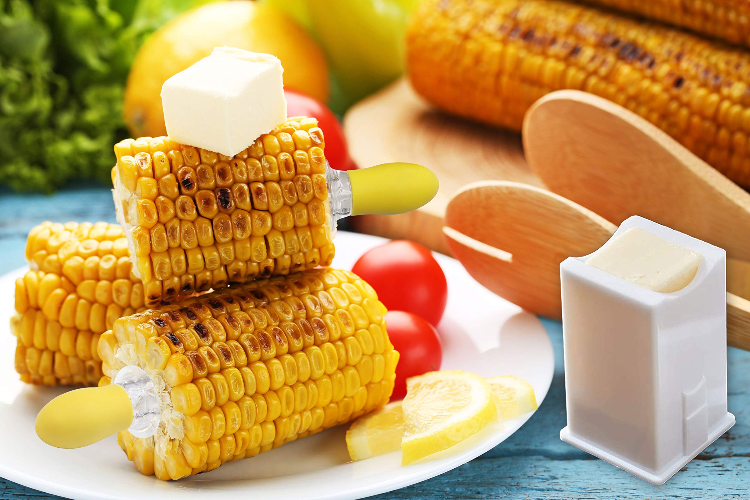 RECOIL butter spreader with curved edges for even buttering.