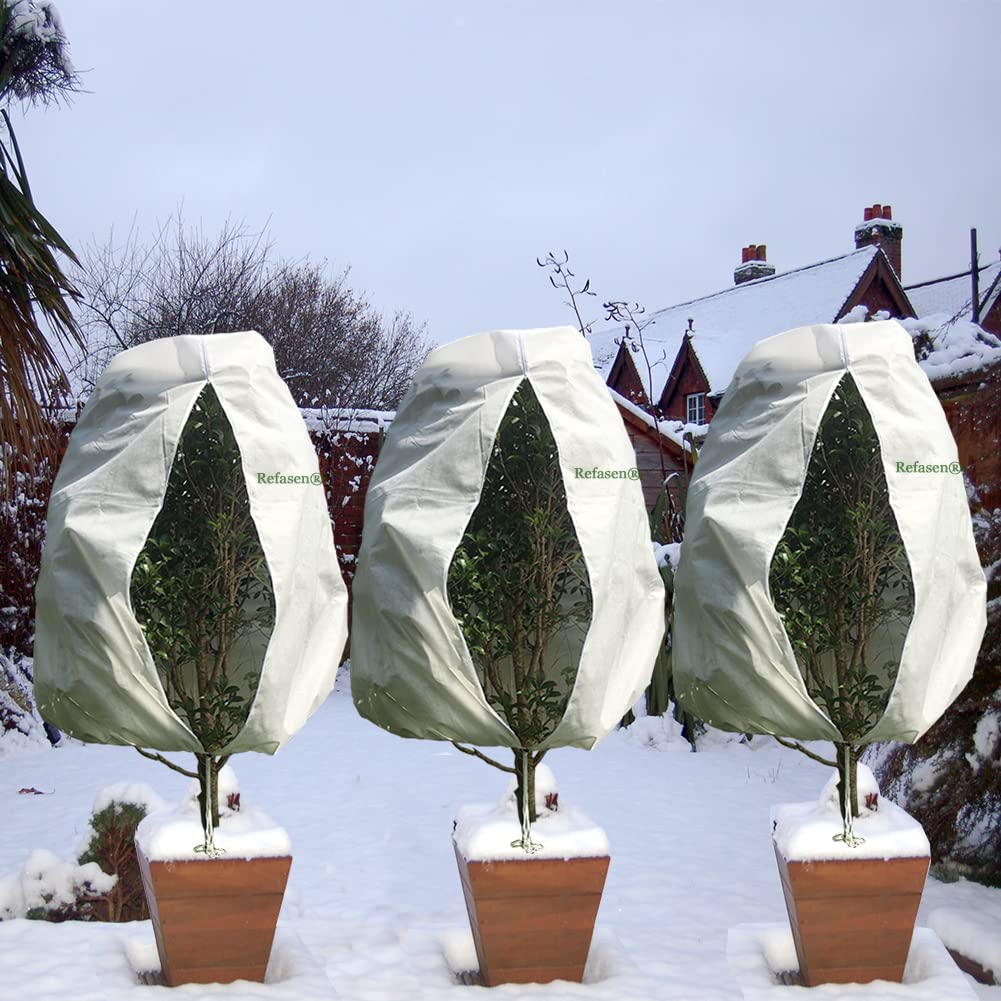 Breathable Refasen frost cloth protecting plants while allowing airflow and light.
