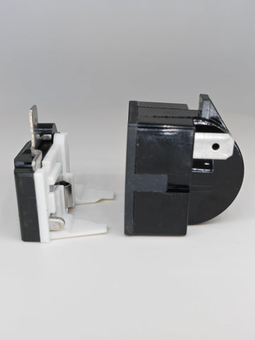 Overload protector in brass and plastic for durability
