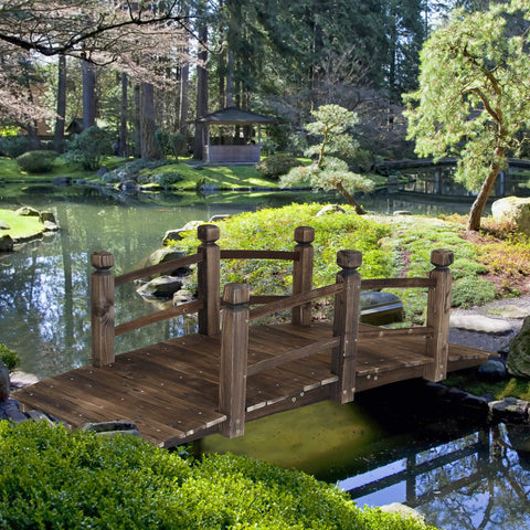 RELIANCER bridge over pond showcases a charming water-side crossing.