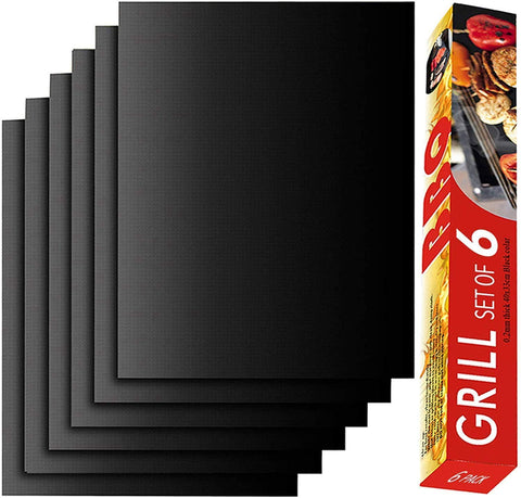 Renook grill mat set on a hot grill showing grill marks and non-stick performance