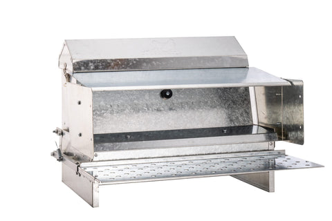 RentACoop automatic treadle feeder shown for outdoor use with protective finish