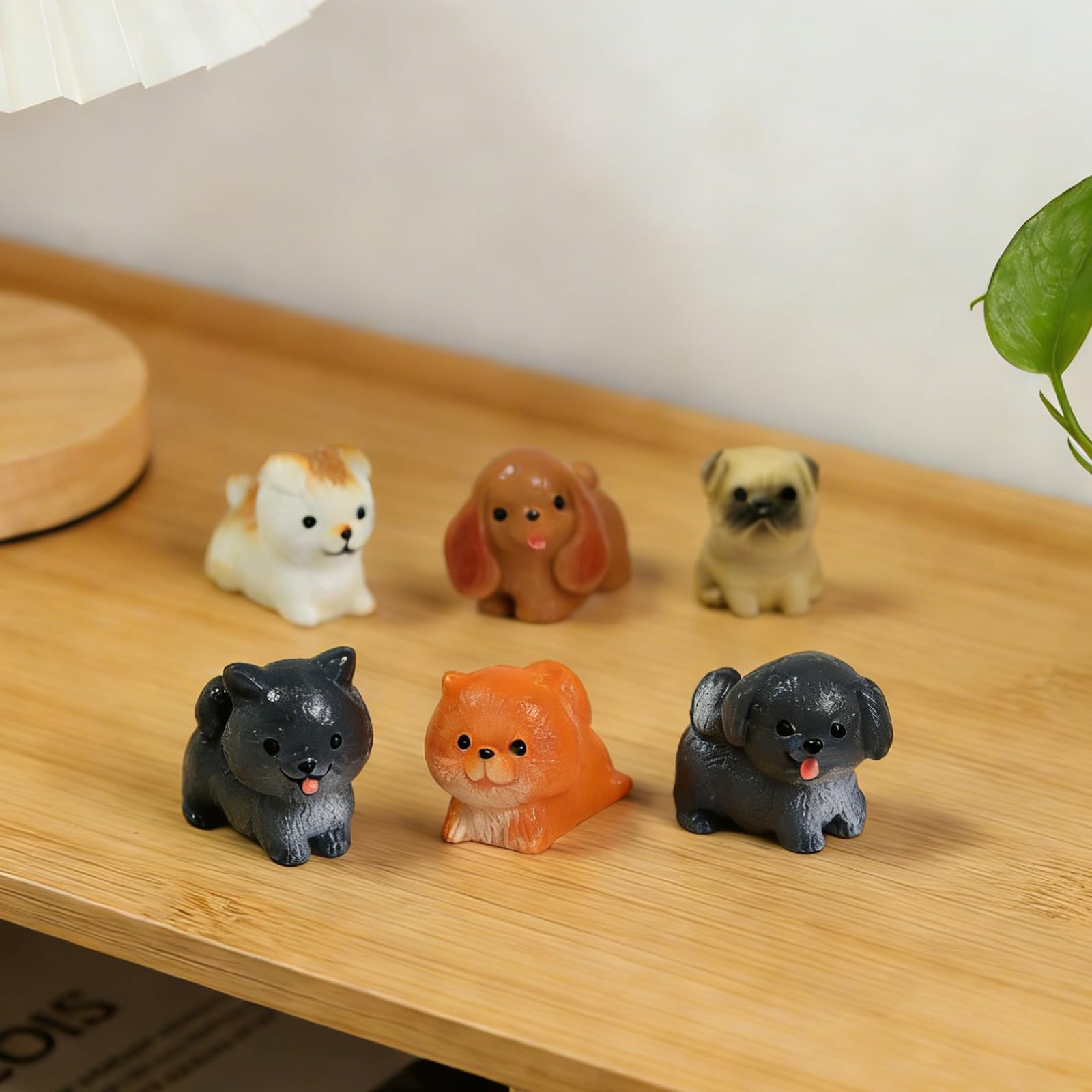 ResinGlow close-up of mini dog figurines showing expressive faces