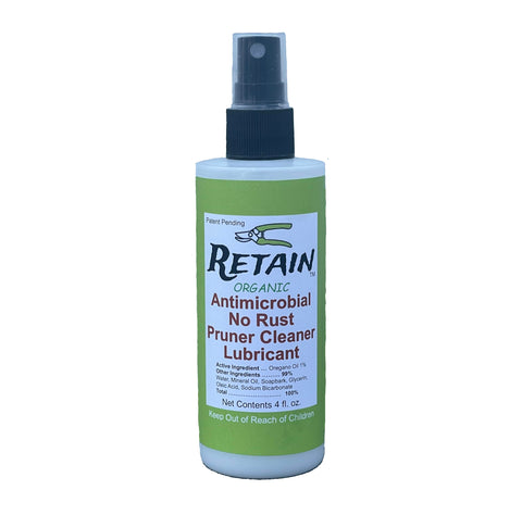 RETAIN Garden Tool Treatment bottle applied to pruner to prevent rust