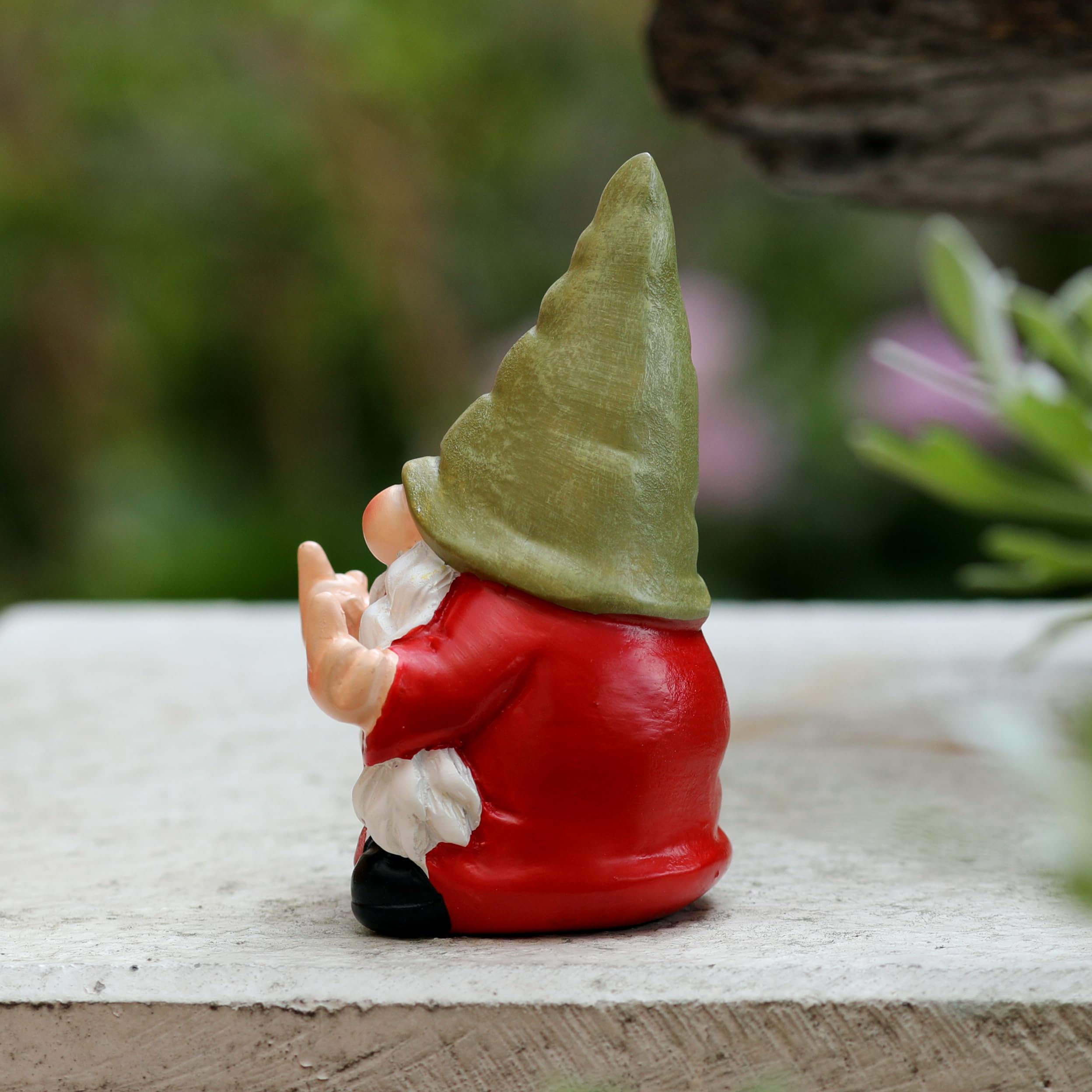 Retro vintage color enhances garden charm on this poly resin gnome.