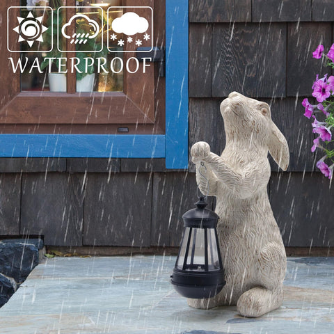 REYISO bunny figurine outdoor solar lantern adds charm to paths and patios after dusk.