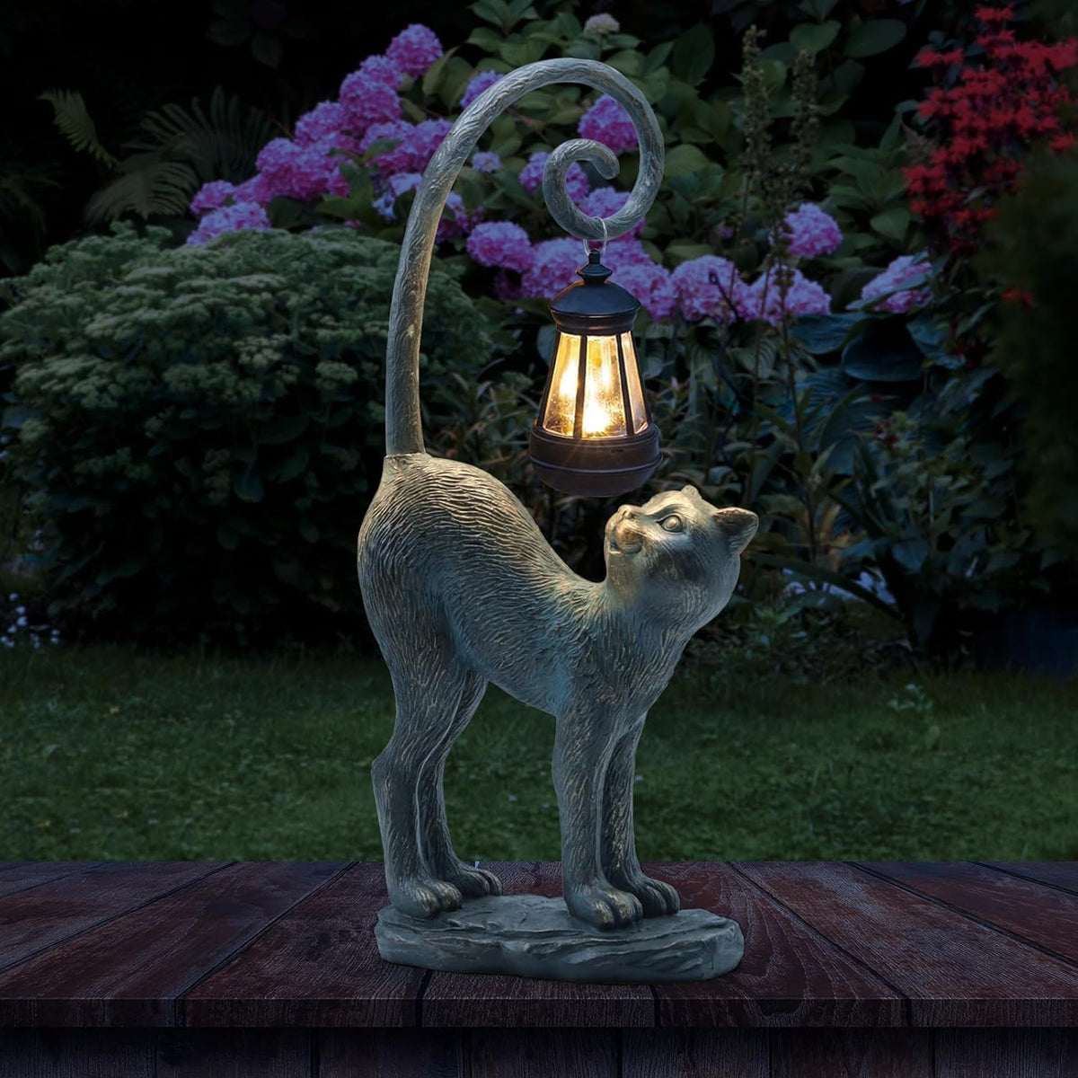REYISO cat garden statue with solar light adds warm nighttime glow to your yard