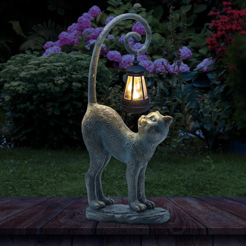REYISO cat garden statue with solar light adds warm nighttime glow to your yard