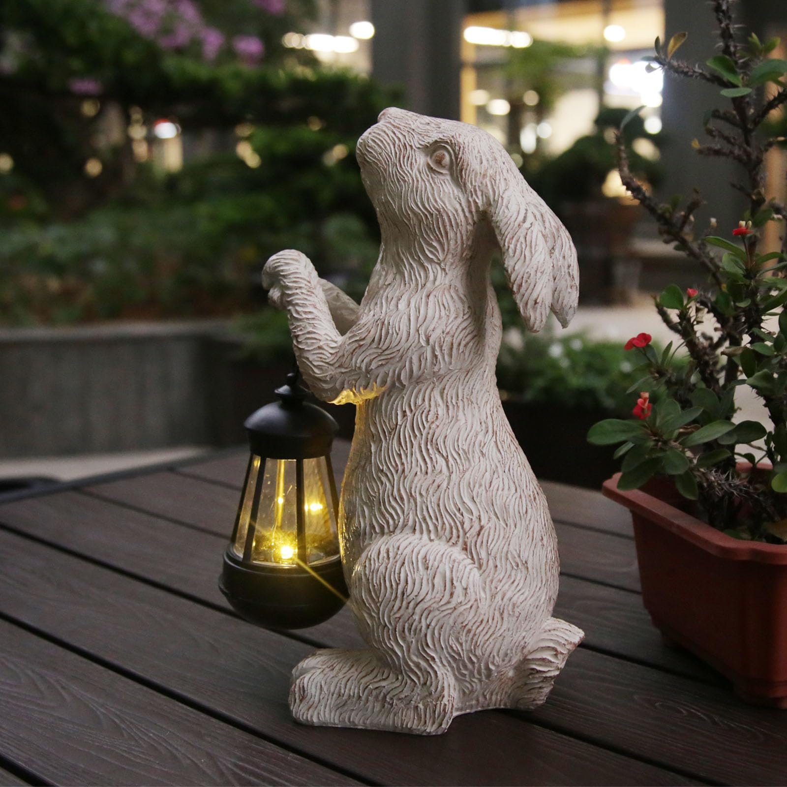 REYISO garden statue rabbit with solar lights lends a welcoming glow to outdoor spaces.