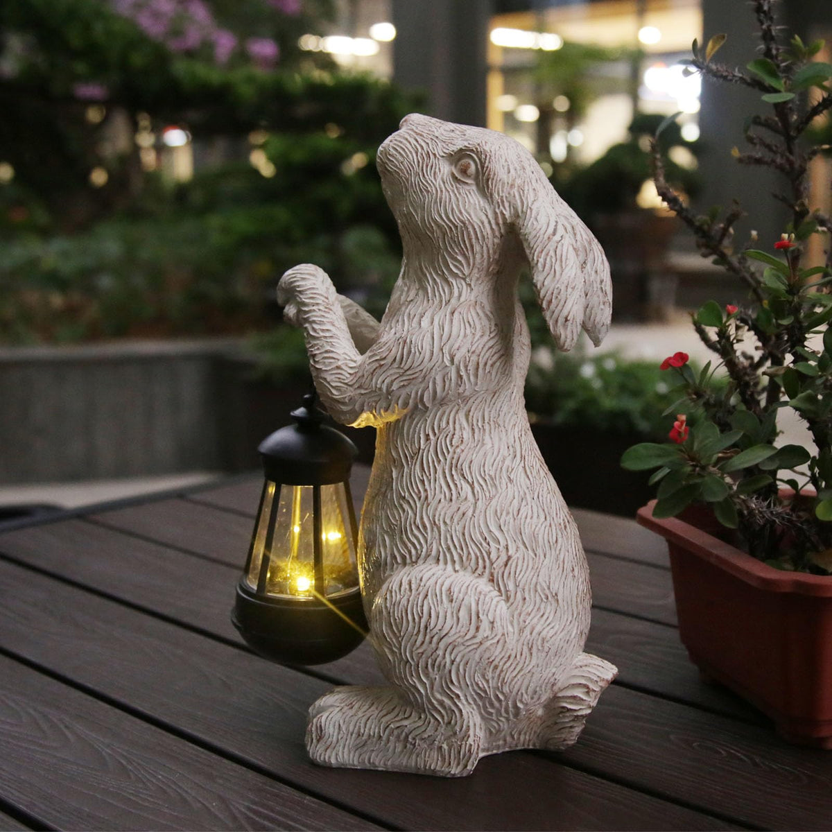REYISO garden statue rabbit with solar lights lends a welcoming glow to outdoor spaces.